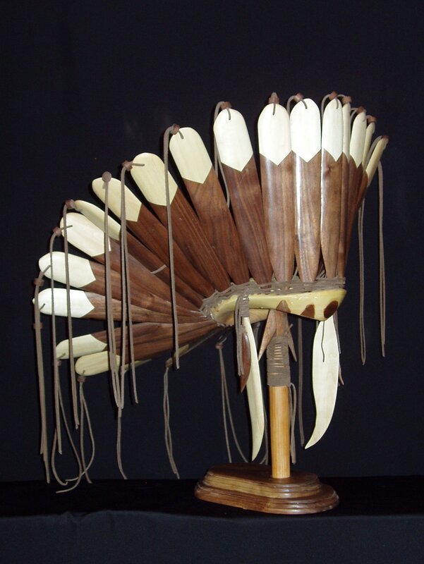 wooden feather headdress sculpture