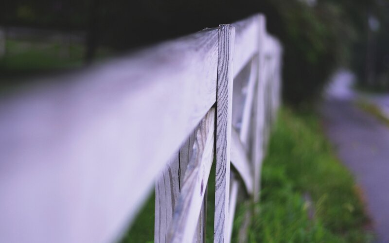 Wooden fence along a path