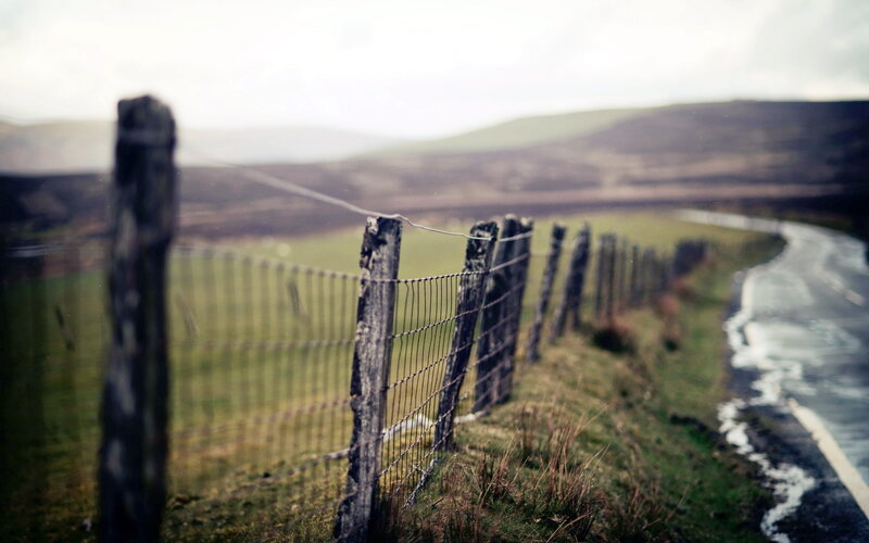 Wooden Fence Along Road