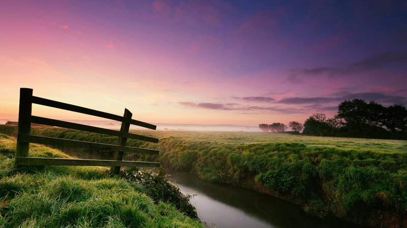 Wooden Fence by Stream