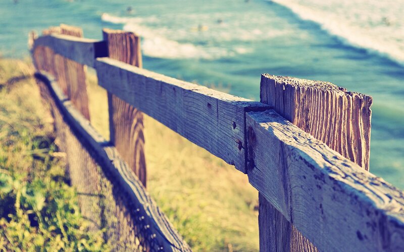 Wooden fence by the ocean