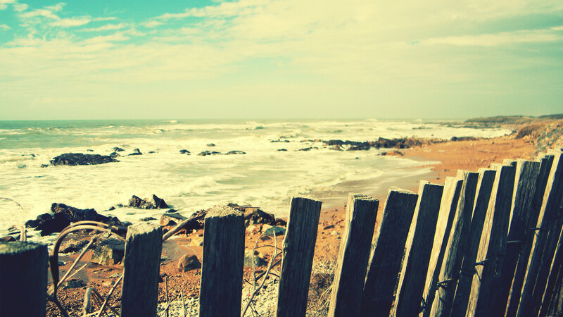 Wooden fence by the ocean
