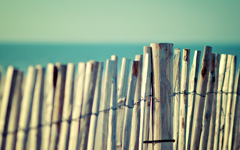 wooden fence by the sea