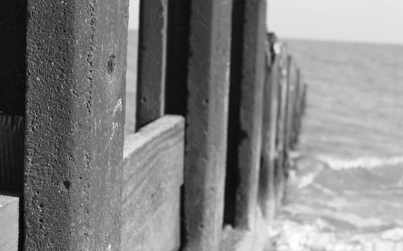 wooden fence by the sea
