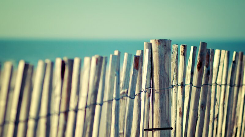 wooden fence by the sea