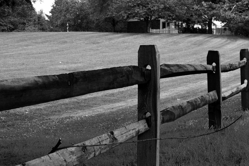 Wooden Fence in Field — Black