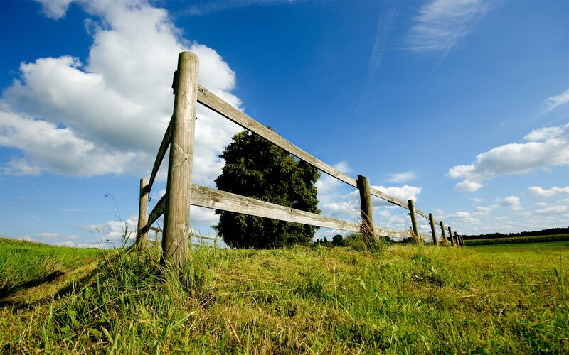 Wooden Fence in Field — Blue