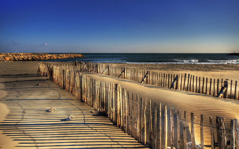 Wooden Fence on Beach — Blue