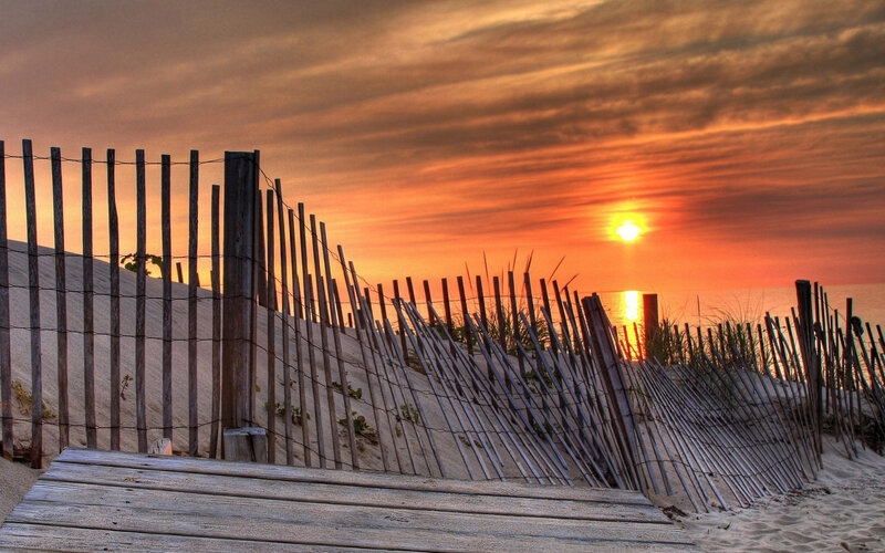 Wooden Fence on Beach — Orange, Serene