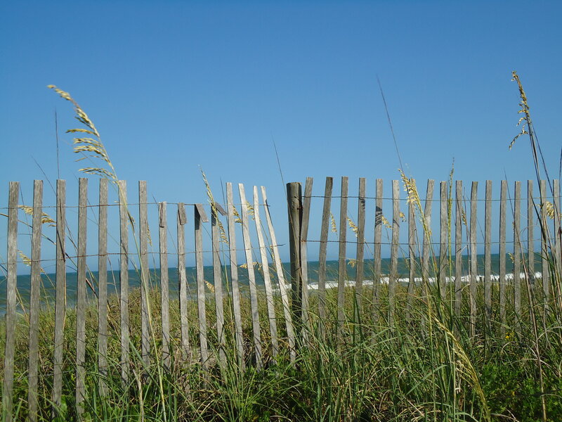 Wooden Fence on Beach