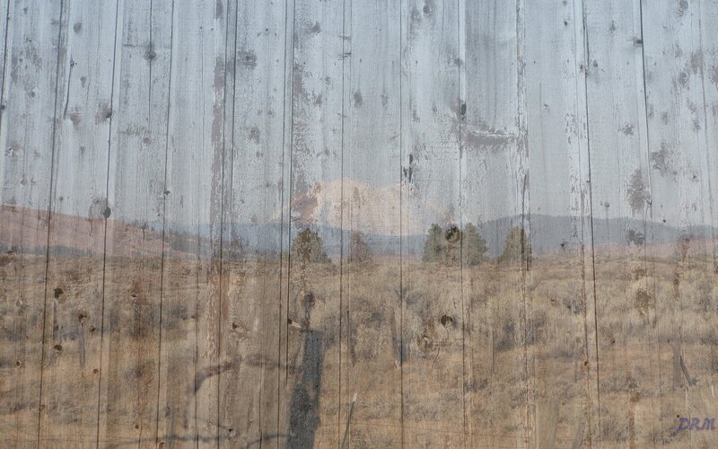 wooden fence with landscape overlay