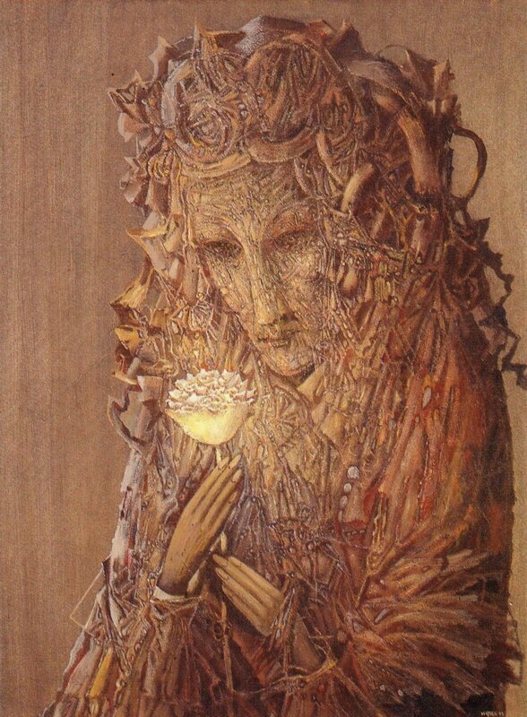 wooden figure holding flower
