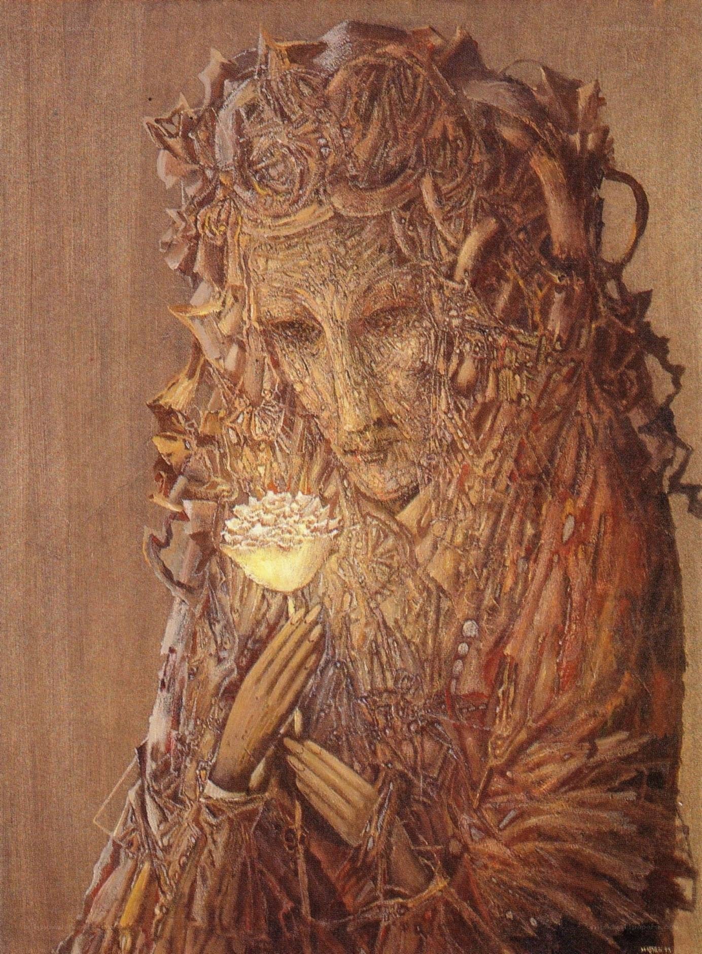 wooden figure holding flower