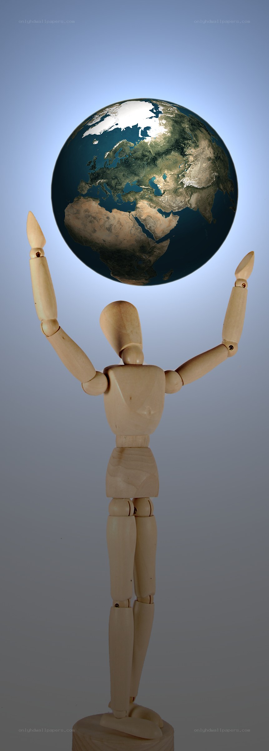 wooden figure holding globe