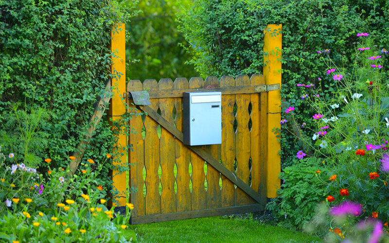 Wooden Gate with Mailbox