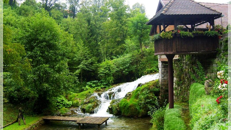 Wooden Gazebo by Waterfall