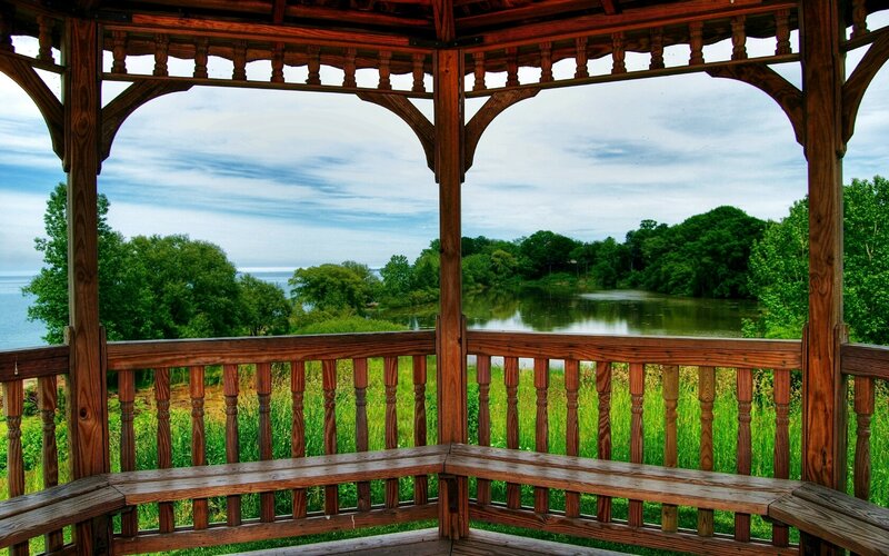 Wooden gazebo overlooking a lake
