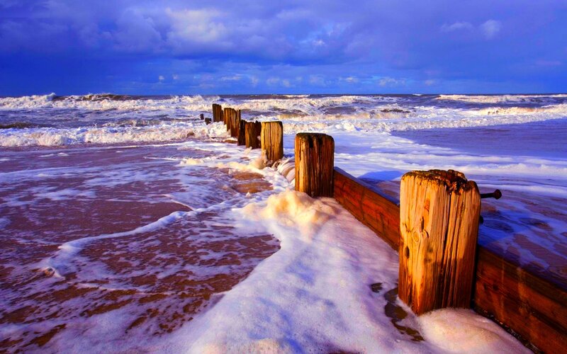 Wooden Groynes on Beach — Blue