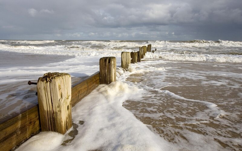 Wooden Groynes on Beach — Brown, Dramatic, Photograph