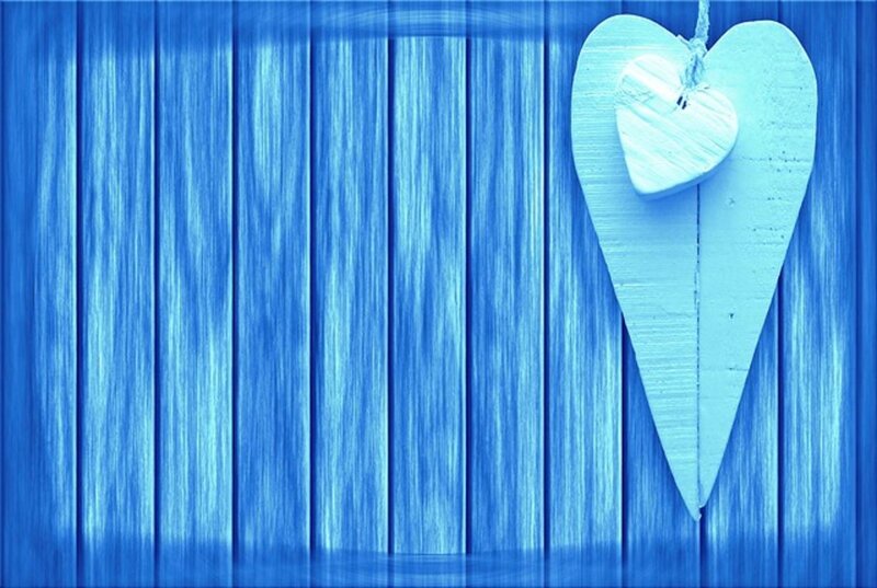 Wooden Heart on Blue Wall
