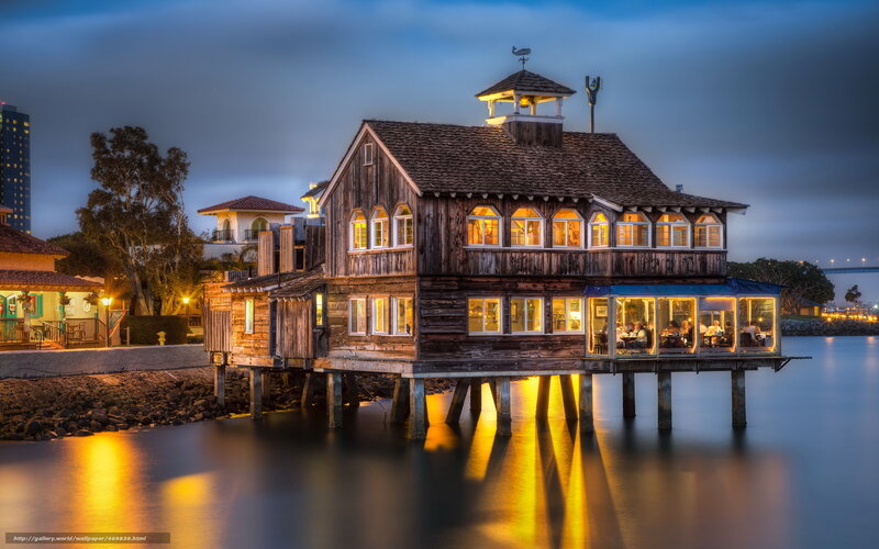 Wooden house on stilts at dusk