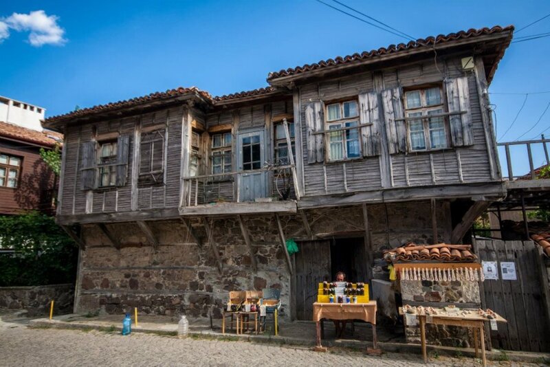 Wooden House on Stone Base