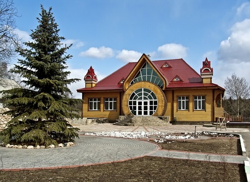 Wooden House with Red Roof