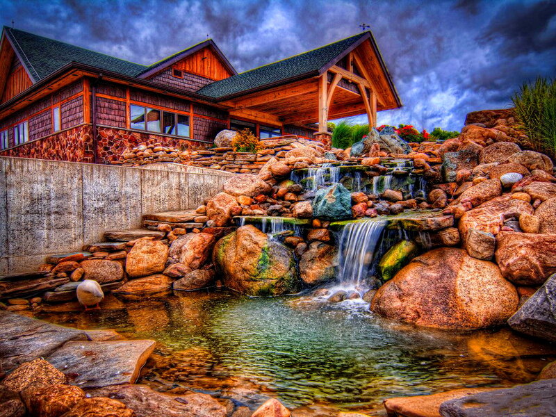 Wooden House with Waterfall