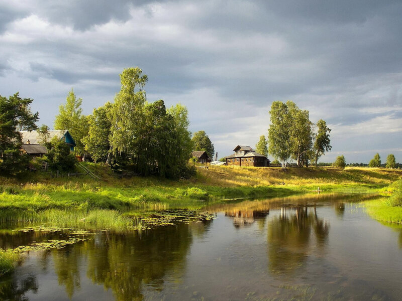 Wooden Houses by River