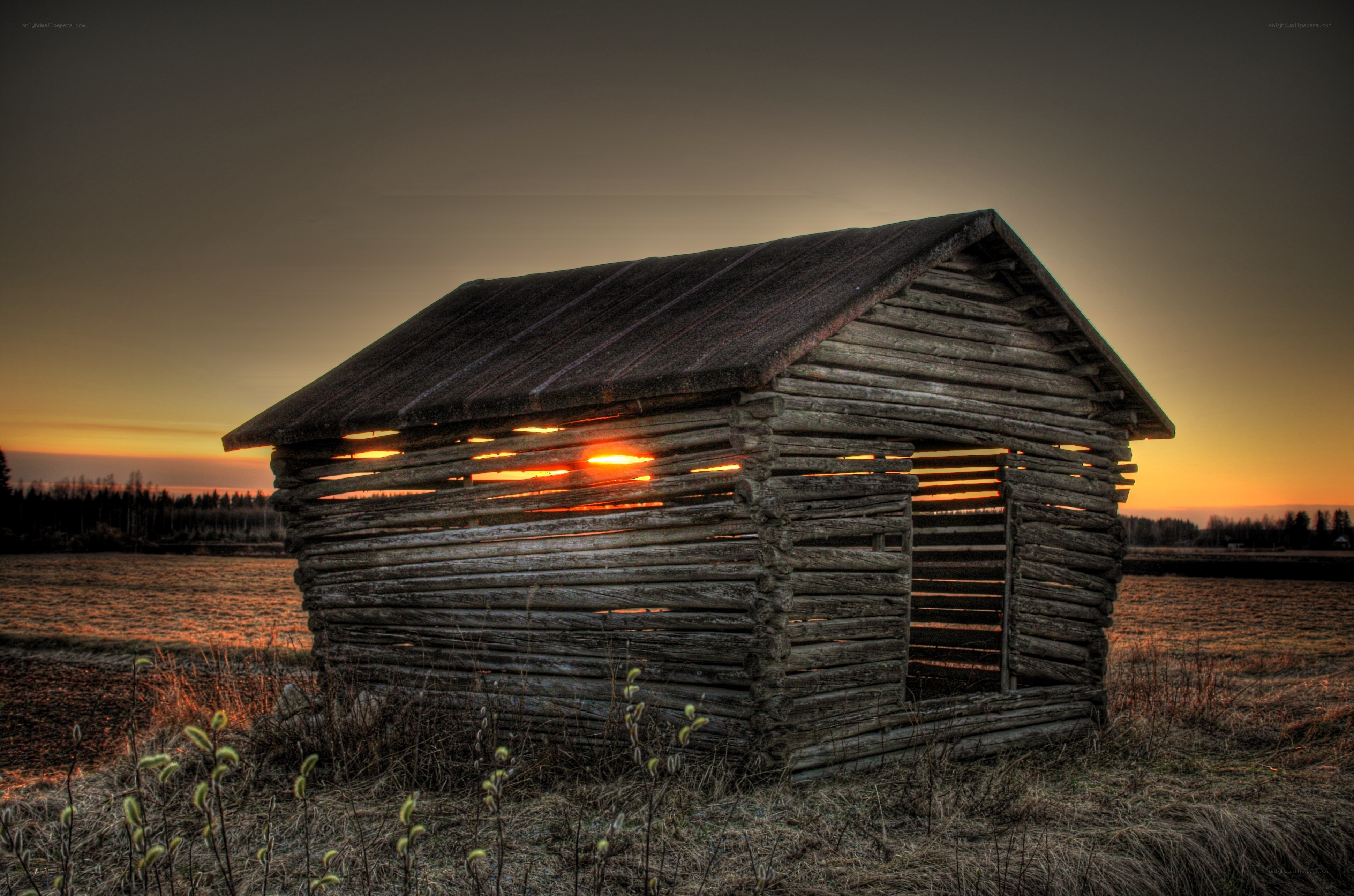Wooden hut at sunset