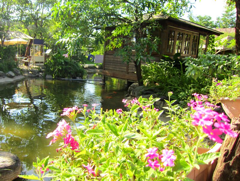 Wooden Hut by Pond