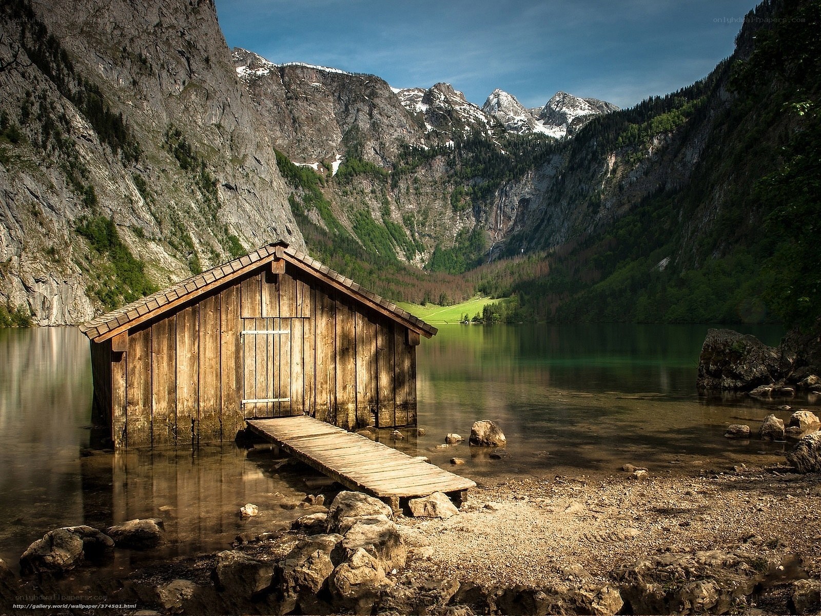Wooden hut on a mountain lake