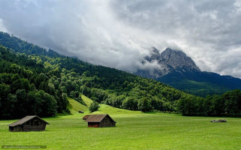 Wooden Huts in Meadow — Green, Dramatic