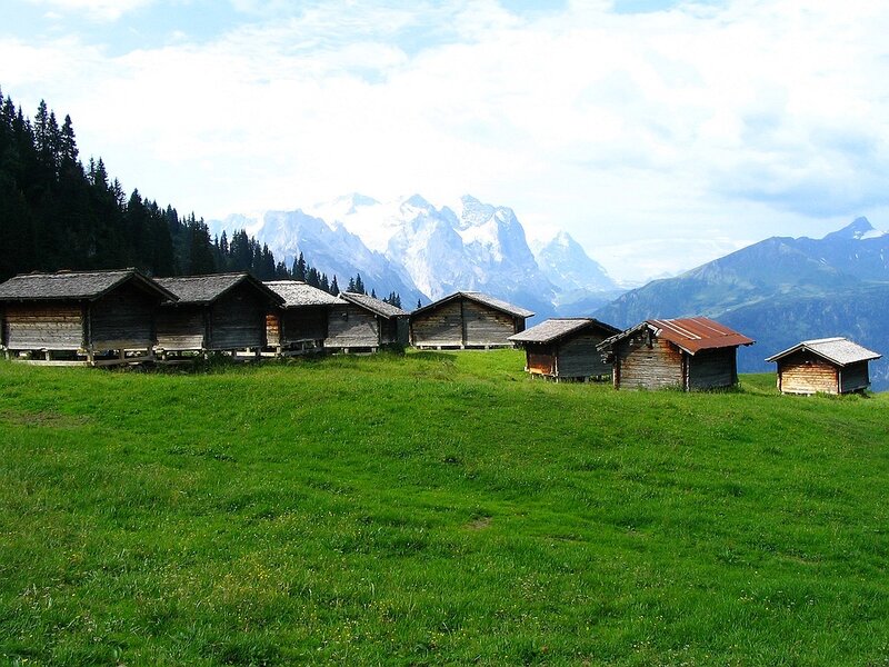 Wooden Huts in Mountains