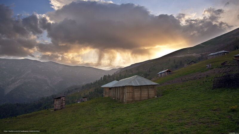 Wooden Huts on Hillside