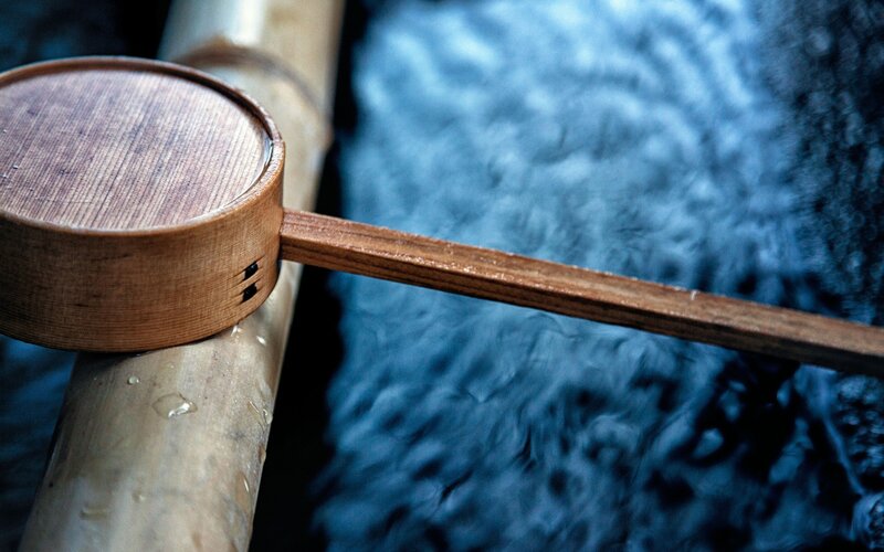 Wooden ladle on bamboo