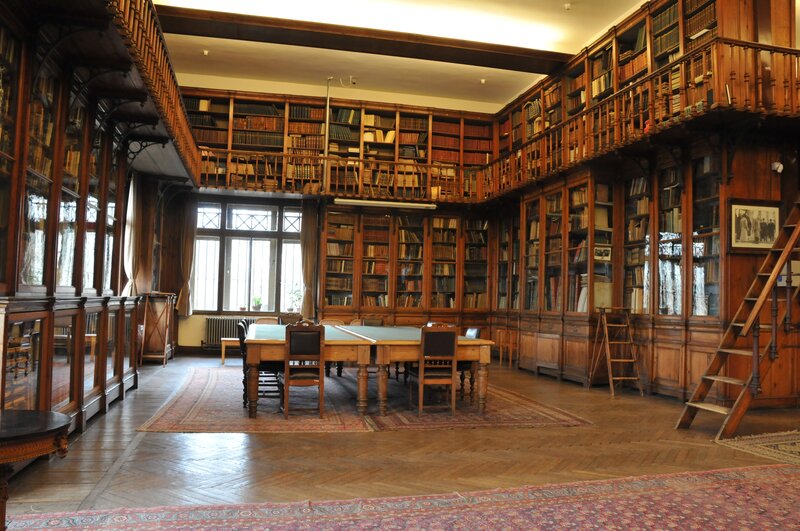 wooden library with bookshelves
