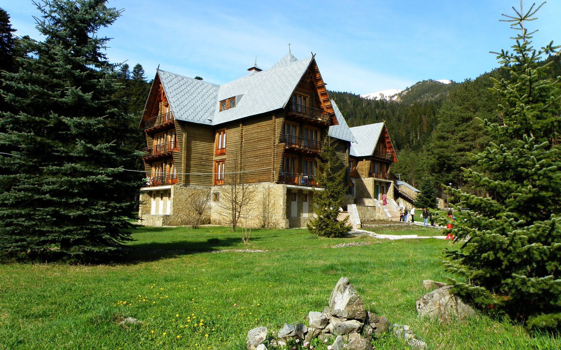 wooden lodge in mountain valley