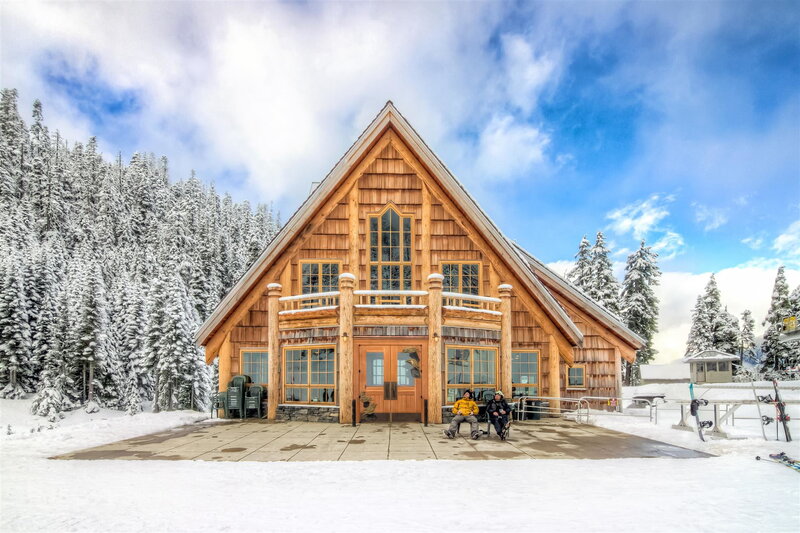 Wooden Lodge in Snow