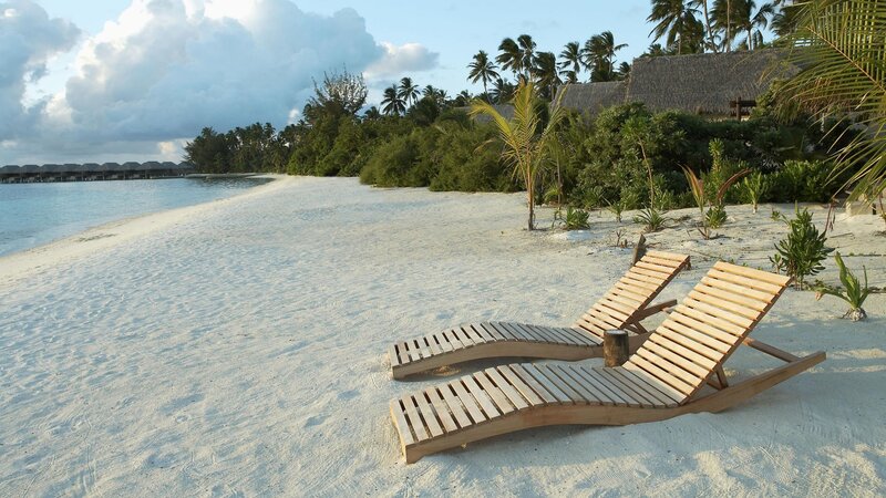 Wooden Lounge Chairs on Beach