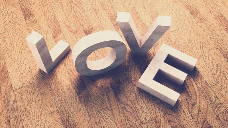 wooden love letters on floor