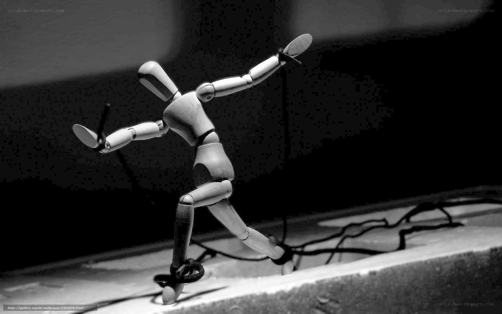 Wooden mannequin in motion