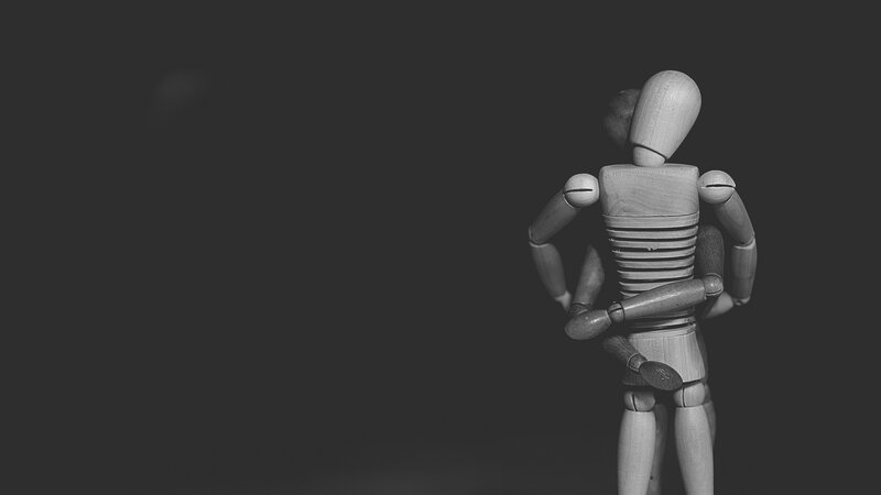 Wooden Mannequins Hugging