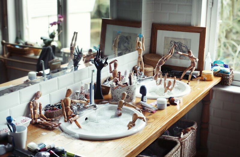 Wooden Mannequins in Sinks