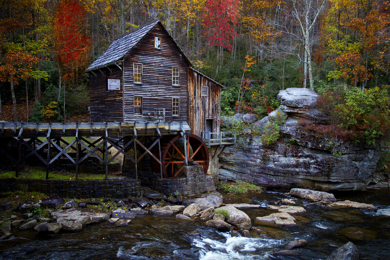 Wooden Mill by River — Brown, Serene, Autumn, Photograph, Trees, Rocks