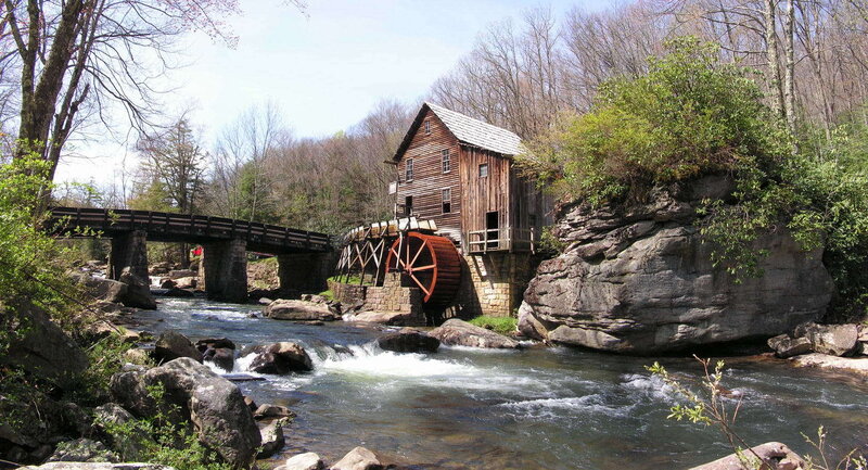 Wooden Mill by River — Brown
