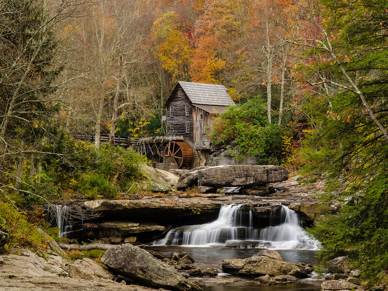 Wooden Mill by Waterfall — Brown