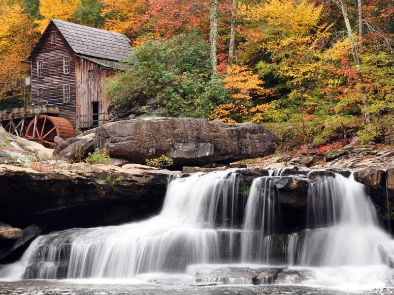 Wooden Mill by Waterfall — Orange