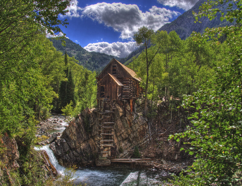 Wooden Mill on Cliff
