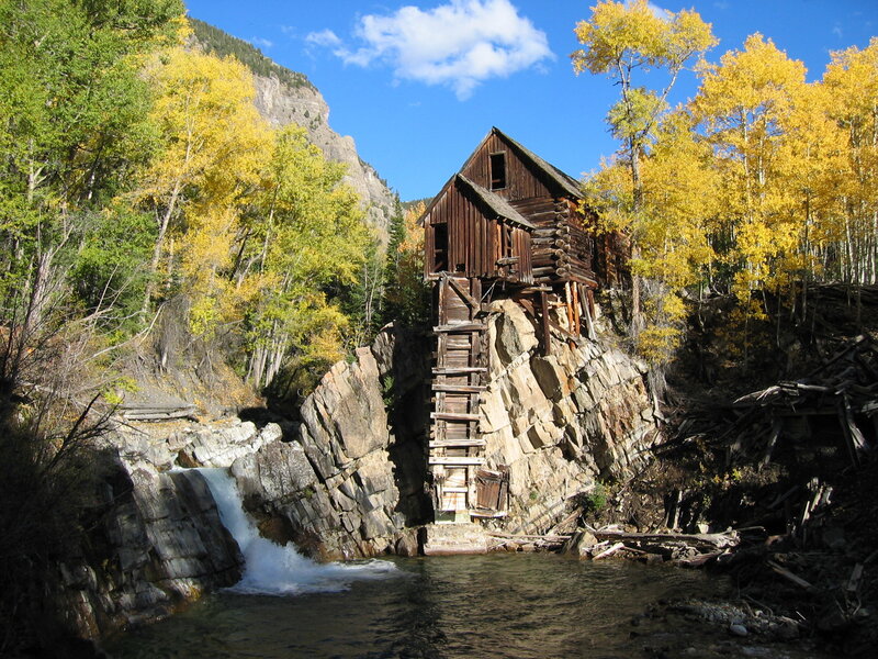 Wooden Mill on Cliff — Yellow